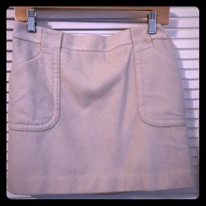 Super cute short wool white skirt.